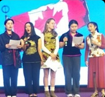  teen volunteers singing 'Oh Canada' at Vancouver Chinese Elderly Citizens Assoc. AGM