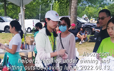 some Moms and Dads of volunteers also worked hard to volunteer in making and serving dumplings at the booth 
